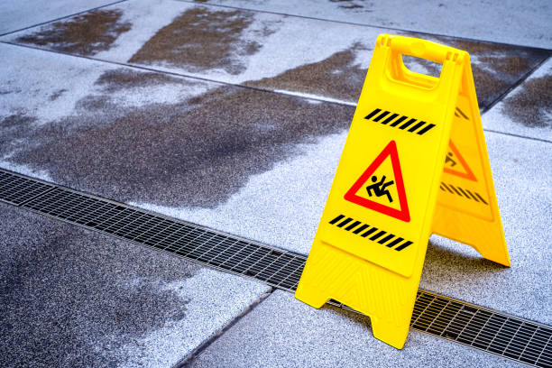 istock slippery warning sign in germany 1359011025