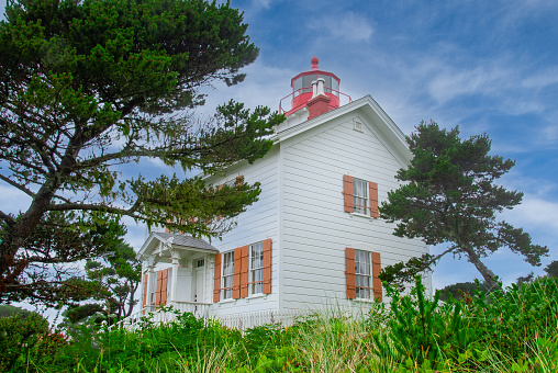 With the advent of radar, GPS and other advanced navigation tools, lighthouses no longer need to perform the same function they once did; guiding ships to safety.  Instead they have been preserved as historic monuments; reminding us of a time when shipping and sailing were more perilous activities.  The Yaquina Bay Lighthouse is located in Newport, Oregon, USA.