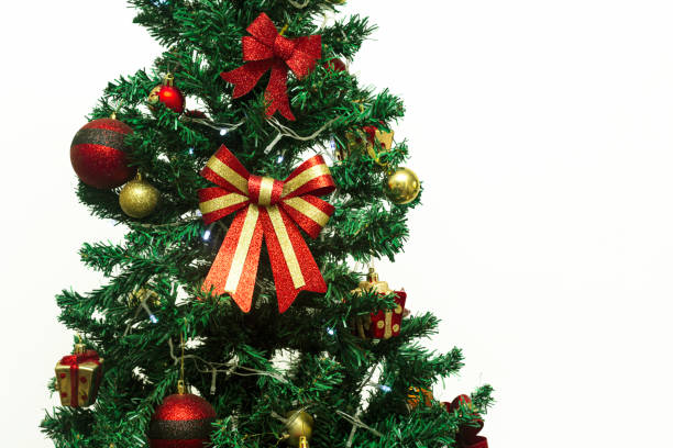 istock Close up of decorations on a Christmas tree. Selective focus and white background. 1359012696