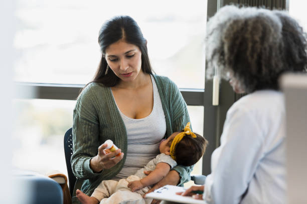istock Concerned new mother asks unrecognizable gynecologist about prescription 1359015946
