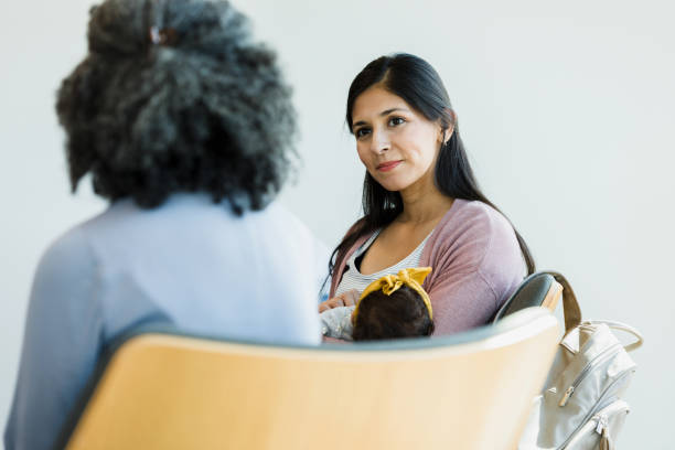 istock New mom listens to advice from unrecognizable therapist 1359015964