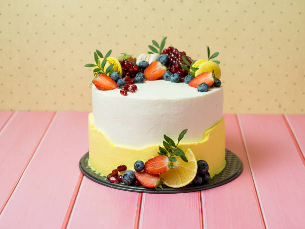 istock beautiful birthday cake decorated with berries with place for text 1359017883