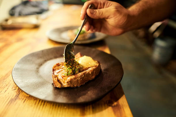 istock Chef preparing meat dish in a restaurant 1359029007