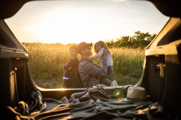 istock Father spending time in nature with his two kids 1359030040