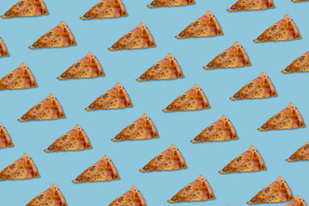 istock Seamless slice or piece of pizza pattern isolated on bright blue background 1359030634
