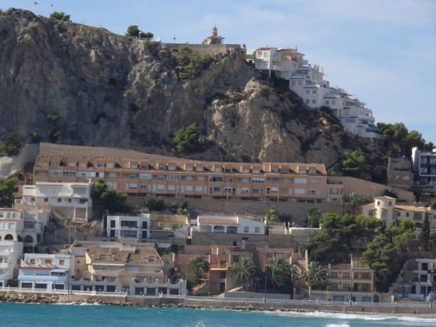 istock houses in sea and rock 1359030774