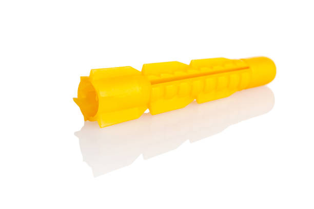 istock Construction dowel for walls, wall mounting, isolated plastic dowel on a white background 1359032913