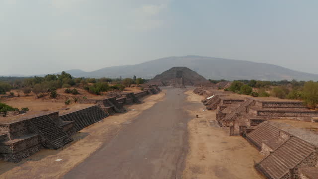 High angle view of Avenue of Dead with Pyramid of Moon in foreground. Drone view of Teotihuacan complex in Mexico with Temple of Moon and the Citadel. Unesco world heritage
