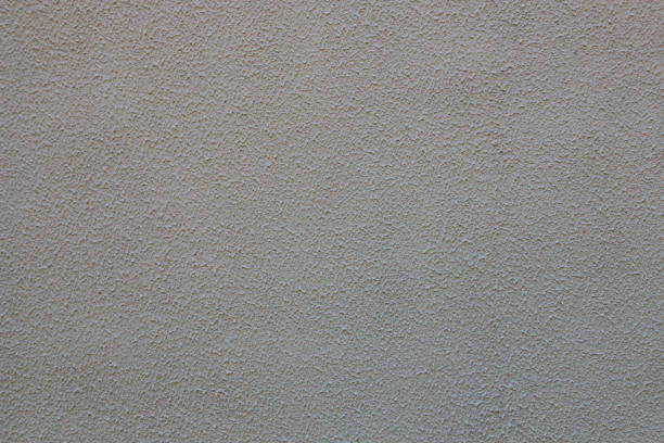 istock Abstract background from old gray old plaster on the concrete wall. 1359043996