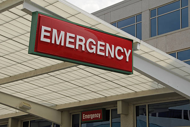 istock Red sign hanging that says emergency 135904439