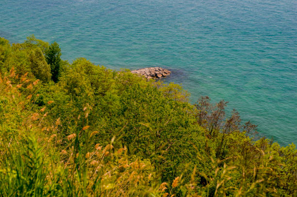 Coastal Views Of A Lake And Ocean From A Cliff On The Shoreline stock photo