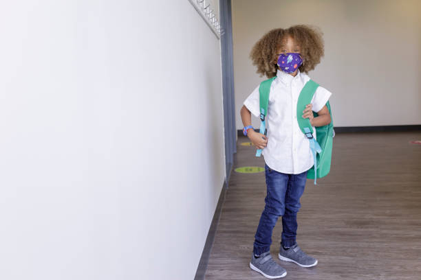 istock Elementary age boy at school during the COVID-19 pandemic 1359046749