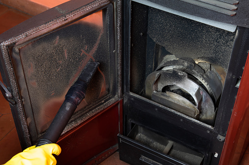 Clean the pellet stove with a vacuum cleaner, which is necessary for stove maintenance