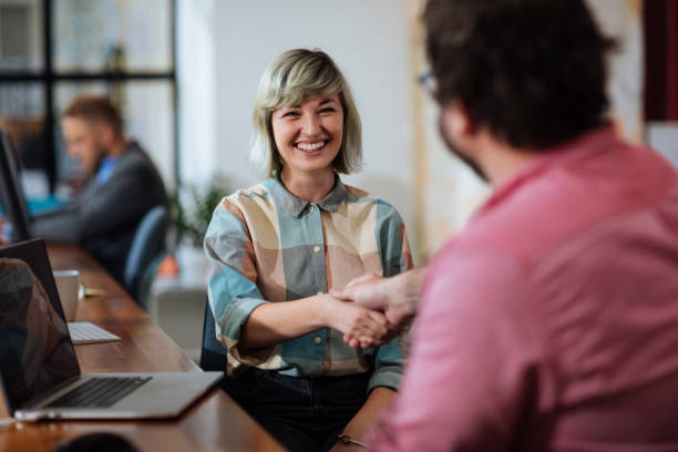istock Making business deals makes her smile 1359048810