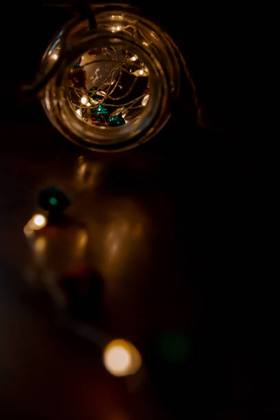 istock Glass jar filled with led lights. 1359049612