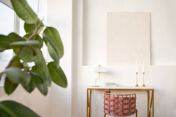istock Table with lamp and books in studio 1359055626