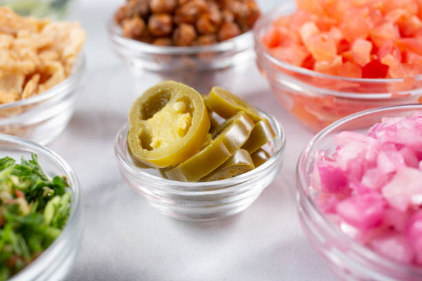 istock cup of pickled jalapenos 1359056490