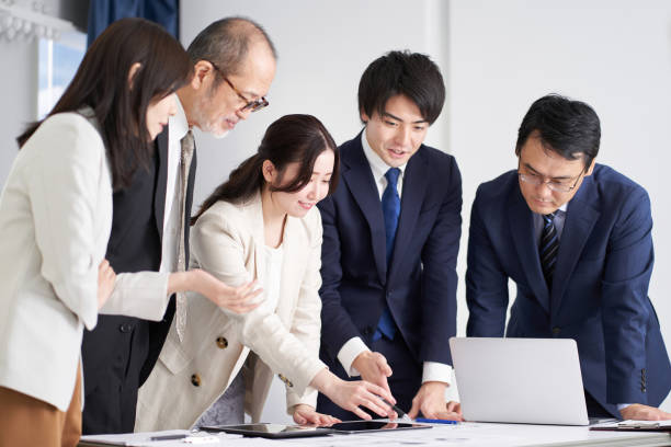 Asian business woman explaining at a meeting