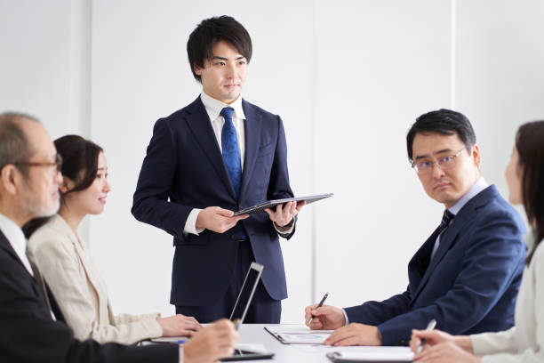 istock Asian businessman explaining at a meeting 1359056760