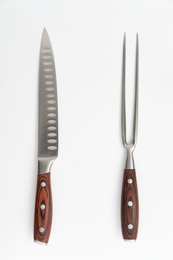 Meat Carving Knife and Fork Set on White Background