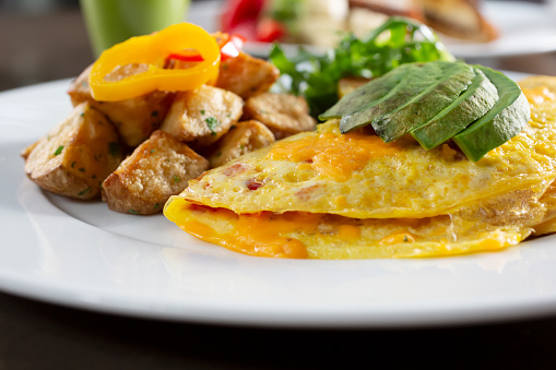 A Nutritious Breakfast with a Mix of Western and Asian Dishes on a Plate