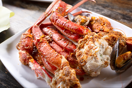 A view of a platter of snow crab legs.
