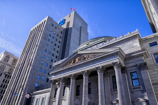 Montreal, Canada - November 19, 2021: Exterior view of Bank of Montreal Building at Place d'Armes.