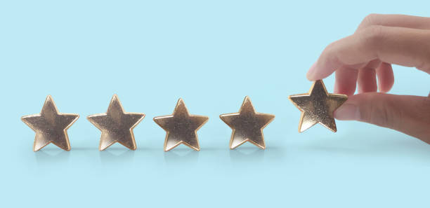 istock Rise on increasing five stars in human hand, Increase rating evaluation 1359069188