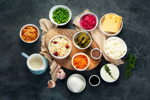 Best sources of probiotic on gray background. Fermented food. Top view, flat lay