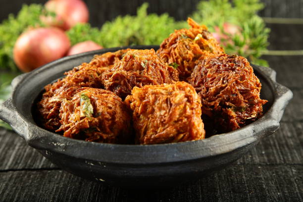 istock Onion  fritters- Delicious pyas pakoda. 1359079272