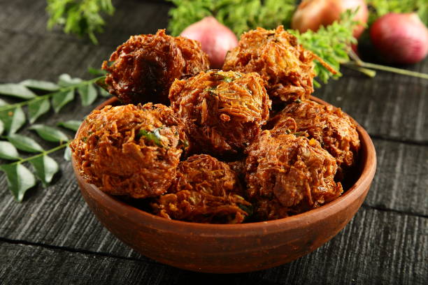 istock Onion  fritters- Delicious pyas pakoda. 1359079302
