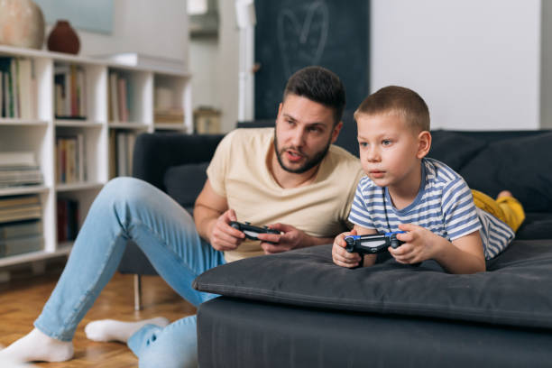 istock father and son at home 1359079663