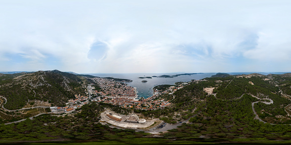 360-degree seamless HDRI panorama from a bird's-eye view. View at amazing archipelago in front of town Hvar, Croatia. Harbor of old Adriatic island town Hvar. Travel VR-content
