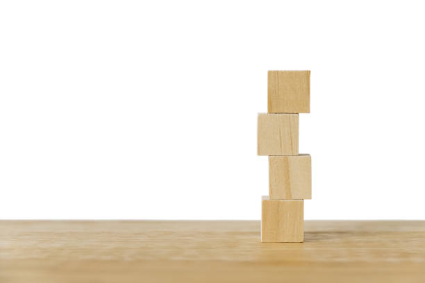 istock stack of blank wooden cubes on wood table with clipping path for infographic icon, input wording and  create icon symbol to success, business growth teamwork or leadership concept 1359082946