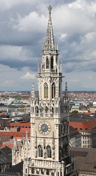 big tower with clock of the town hall of the city of Munich in Germany