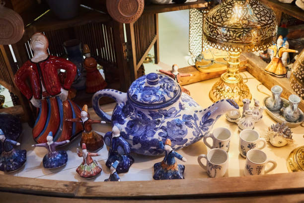 Multicolored traditional ceramics at the market stock photo