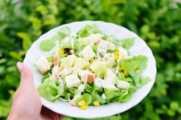 istock Mixed fresh vegetables salad in white dish 1359088474