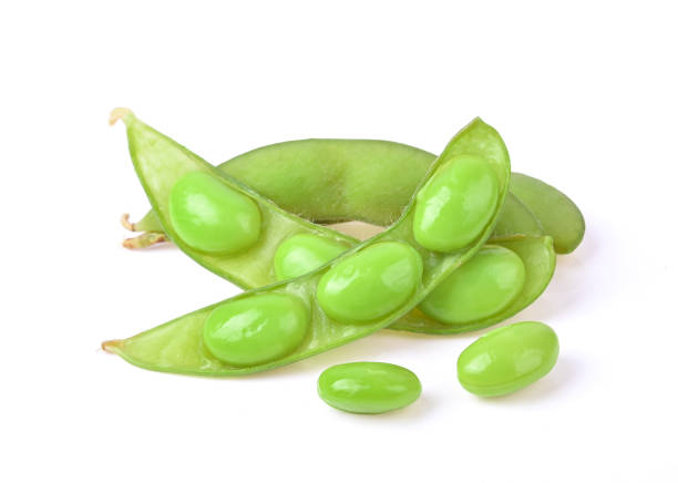 istock Green soy beans isolated on white background. 1359088785