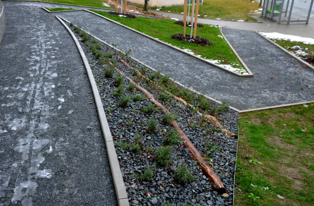 istock construction of a steep staircase by the stone wall car park with high durability even under heavy load galvanized steel floor grate and railings. gabion above him a wire fence. corridor, narrow 1359096527
