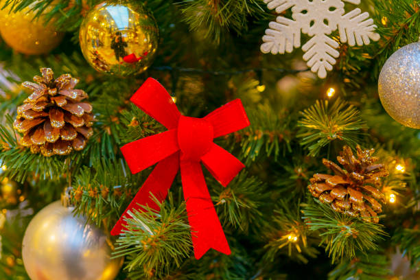 istock Holiday decorations for the Christmas tree. Blurred holiday background. 1359101869