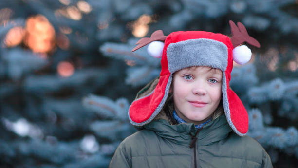 istock A boy in a Christmas hat 1359102283