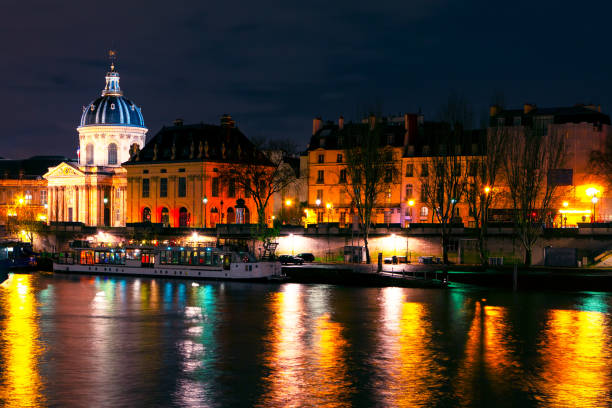 istock Illuminated Seine riverside in Paris 1359102418