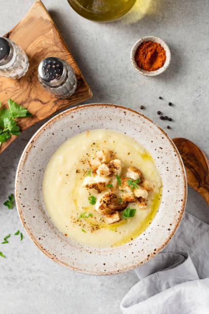 istock Cream soup of cauliflower with croutons 1359102574