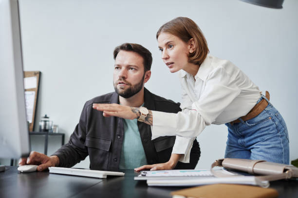 istock Business colleagues working at office 1359104067
