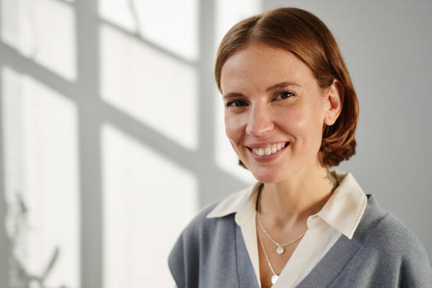 istock Successful young businesswoman smiling 1359104151