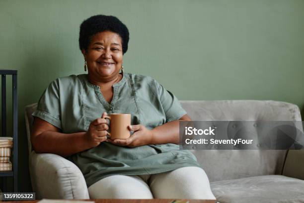 Black Senior Woman Enjoying Coffee Stock Photo - Download Image Now - Senior Adult, Women, One Woman Only