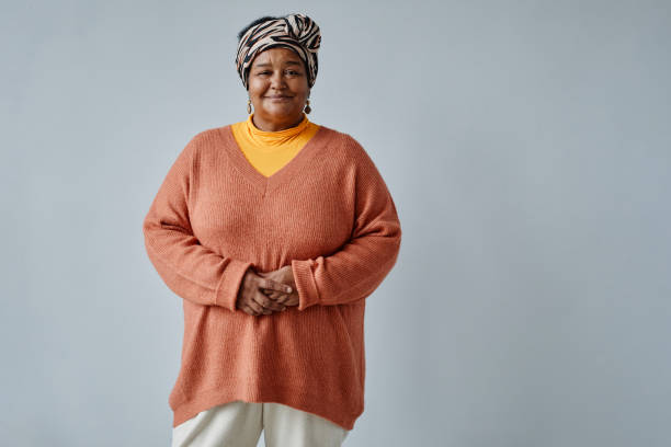 Cheerful Black Senior Woman in Studio