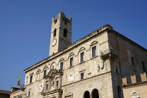 Ascoli Piceno, Italy - June 9, 2021: Ascoli Piceno, Marche, Italy: historic buildings by morning. Piazza del Popolo, the main square of the city