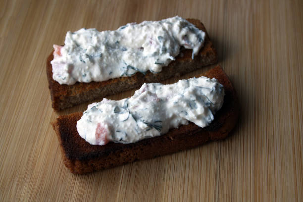 istock Cottage cheese dip and black bread toast. Breakfast. 1359111482