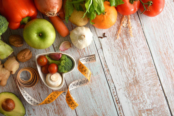 istock Balanced menu concept with vegetables on wooden table 1359111639